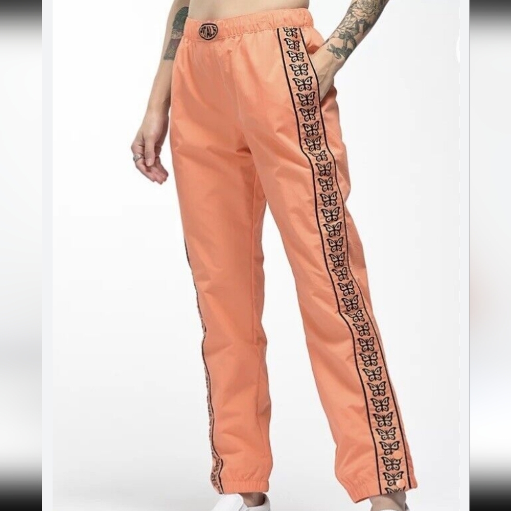 Petals monarch butterfly orange joggers